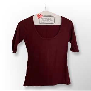 Burgundy short sleeve ribbed, scooped neck Reformation top. Excellent condition.